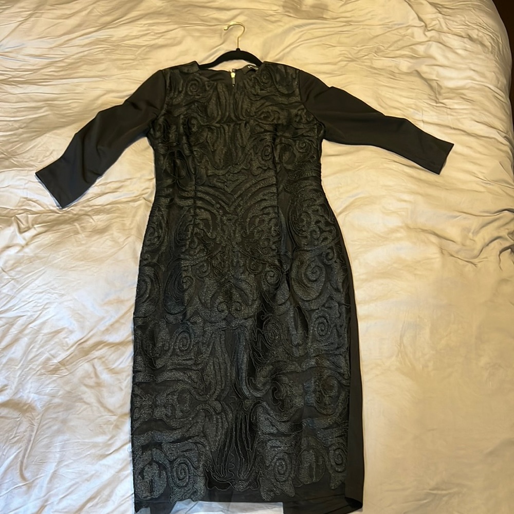 Black cocktail dress with lacy overlay and zipper back